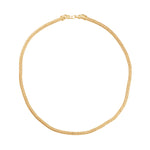 Gold necklace on a white background