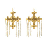 Crotalia Crucifix - Gold cross-shaped earrings with pearl tassel details.