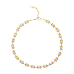 A gold-plated necklace with white pearl beads, each bead capped with gold accents in a Roman style.
